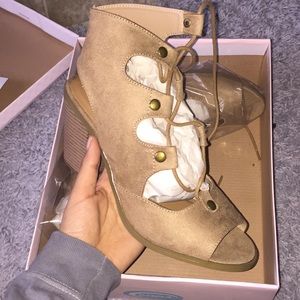 Peep toe lace up booties
